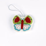 A beaded butterfly felt Christmas ornament