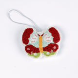 A beaded butterfly felt Christmas ornament