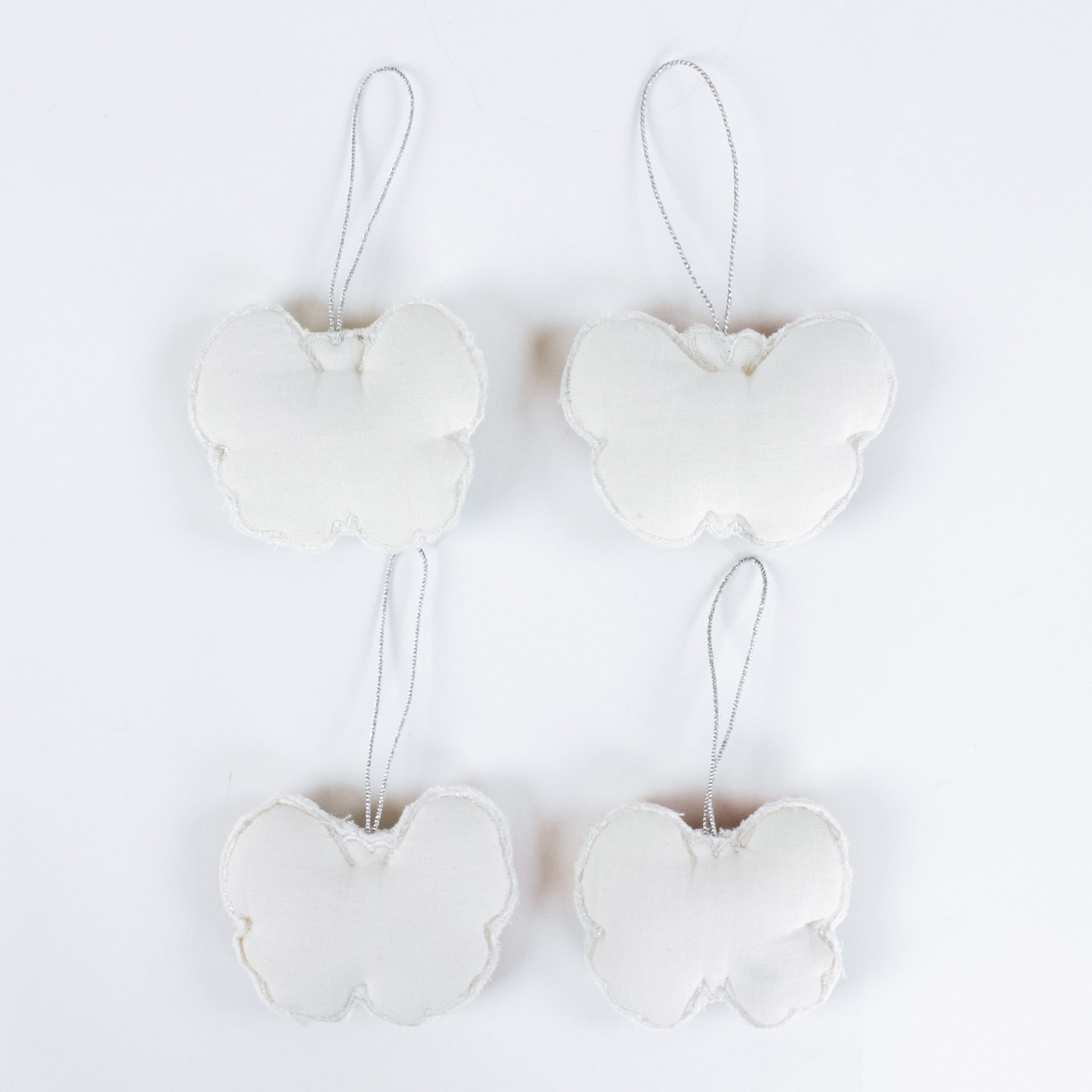 back of A set of four beaded butterfly felt Christmas ornaments