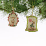 Cupid and Dasher Hand Painted Beaded Reindeer Christmas Ornaments with red bow and green bead trim.