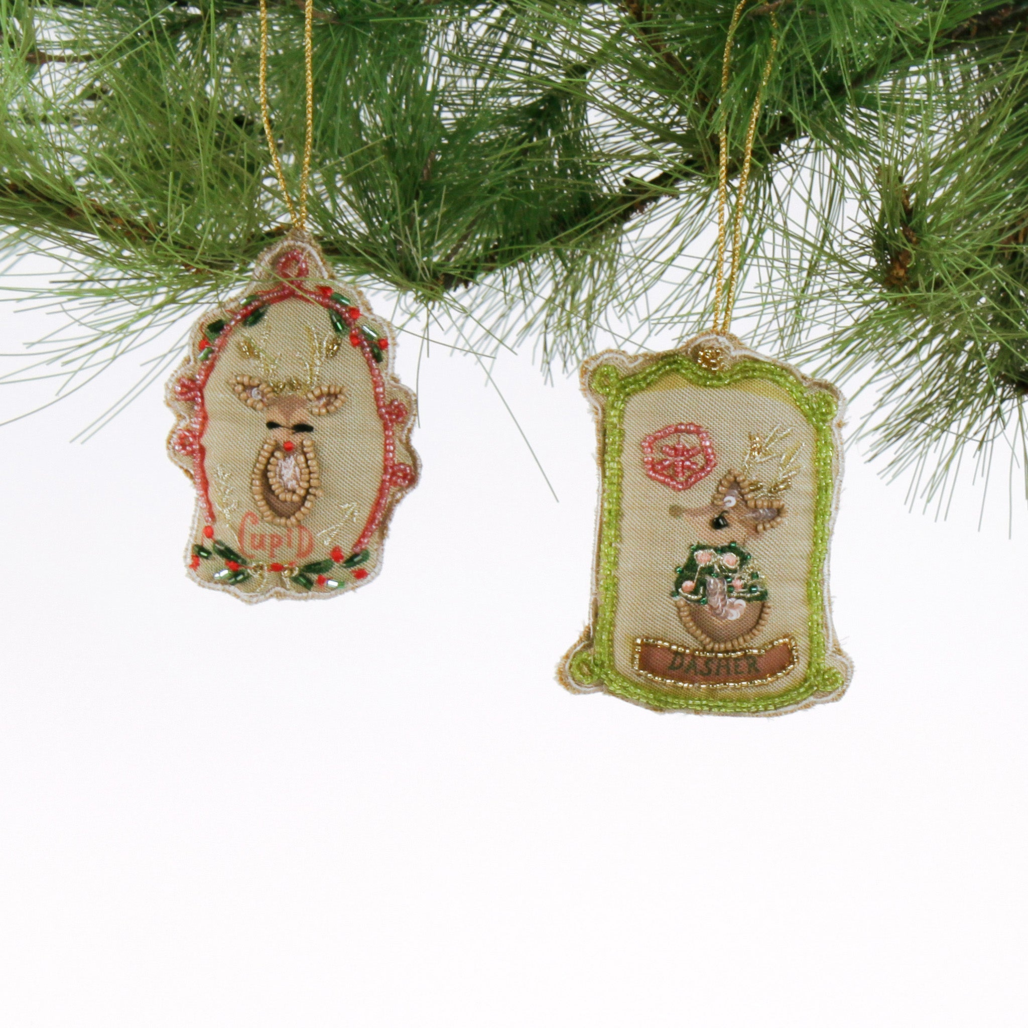 Cupid and Dasher Hand Painted Beaded Reindeer Christmas Ornaments with red bow and green bead trim.