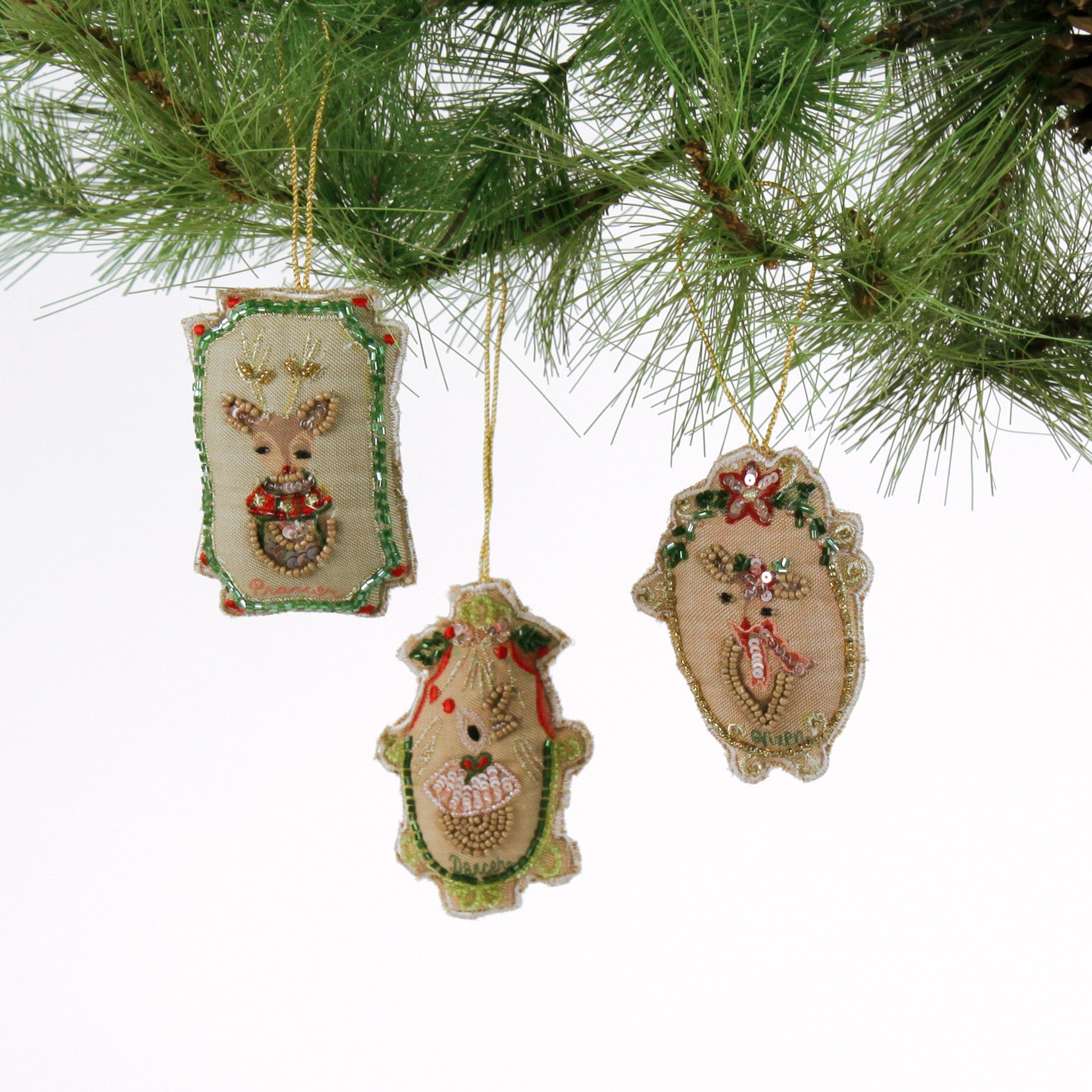 Trio of Hand Painted Beaded Reindeer Christmas Ornaments including Prancer, Dancer, and Vixen.