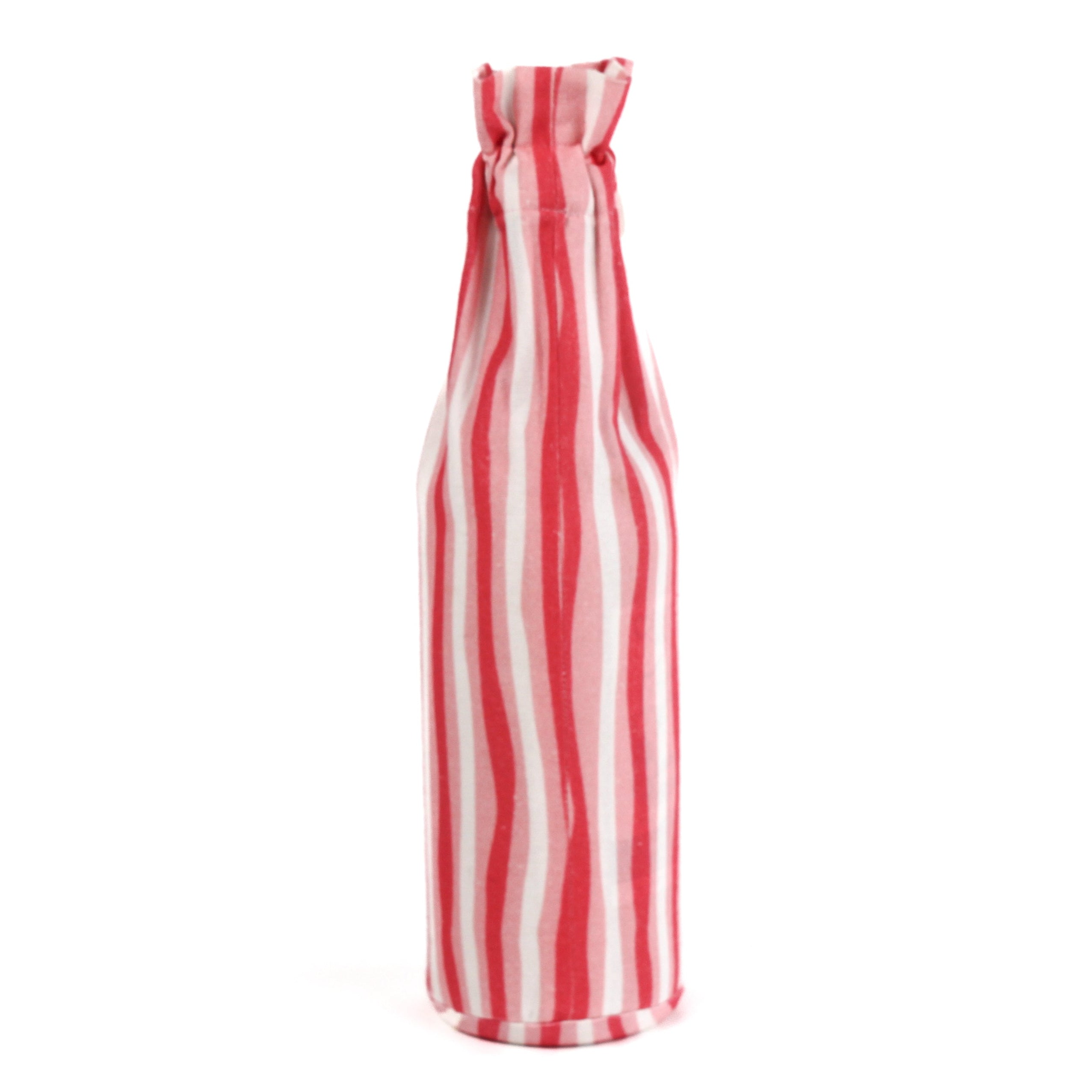 back of the Madcap Cottage Red and white striped bottle bag with a text "Be Naughty! Save Santa the trip" on a white background