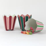three striped cachepots in shades of pink, red and green from madcap cottage