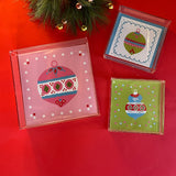 Three square Acrylic Trays in different sizes with three different Ornament motifs on them