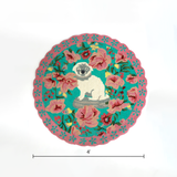A pink and green floral rug featuring a scalloped border and large central pug motif dimension