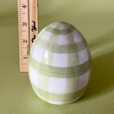 green gingham decorative easter egg with ruler to illustrate scale