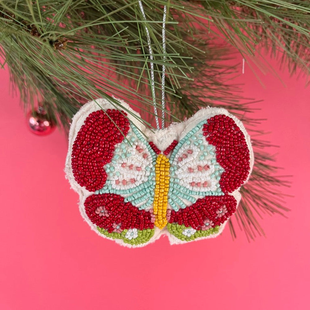 A beaded butterfly felt Christmas ornament