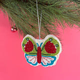 A beaded butterfly felt Christmas ornament