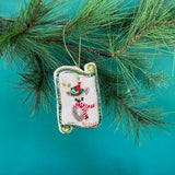 Blitzen Hand Painted Beaded Reindeer Christmas Ornament with pink beads and festive trim.