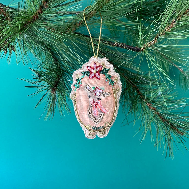 Hand Painted Beaded Reindeer Christmas Ornaments displayed on tree branch.
