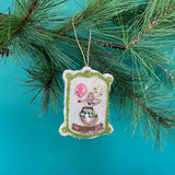 hand Painted Beaded Reindeer Christmas Ornament with green border and gold accents.