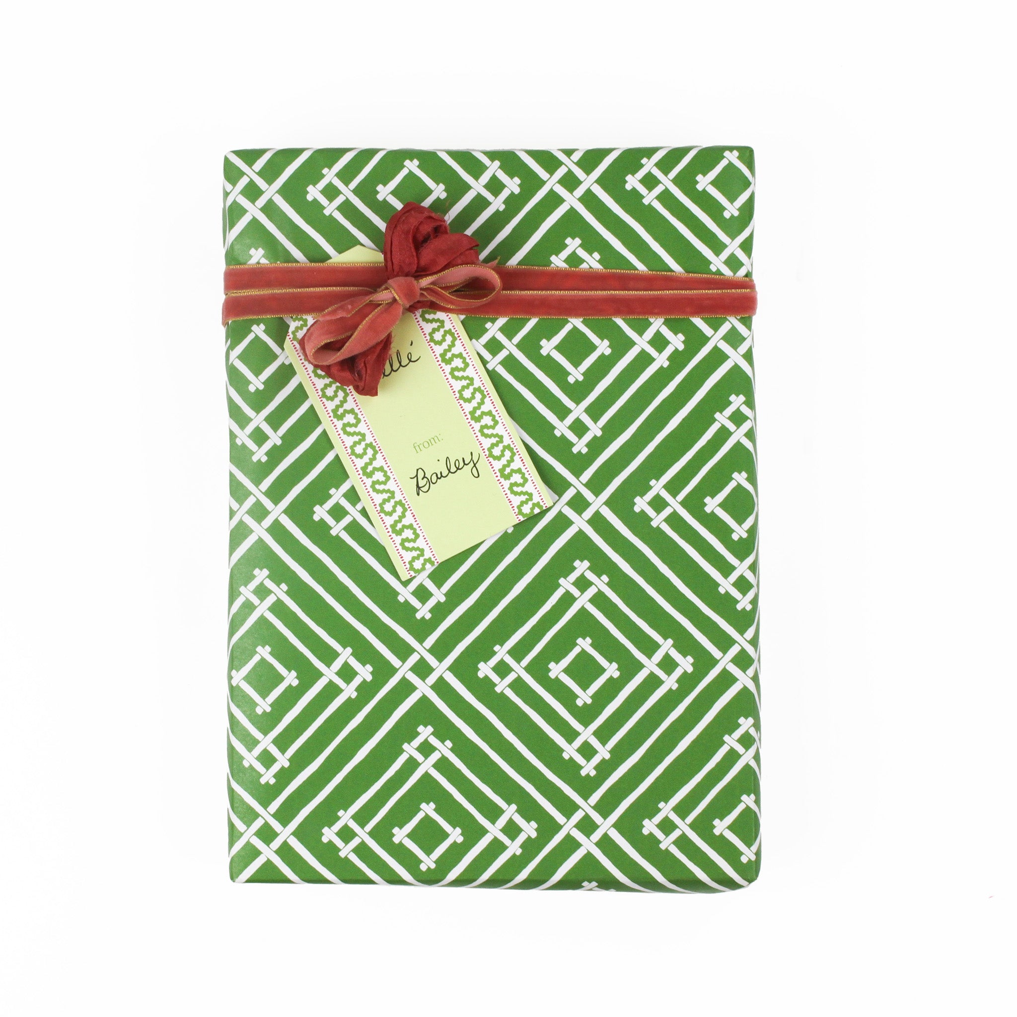 a Harbor Trail green Gift Tag with a space for personal message, attached to a wrapped present