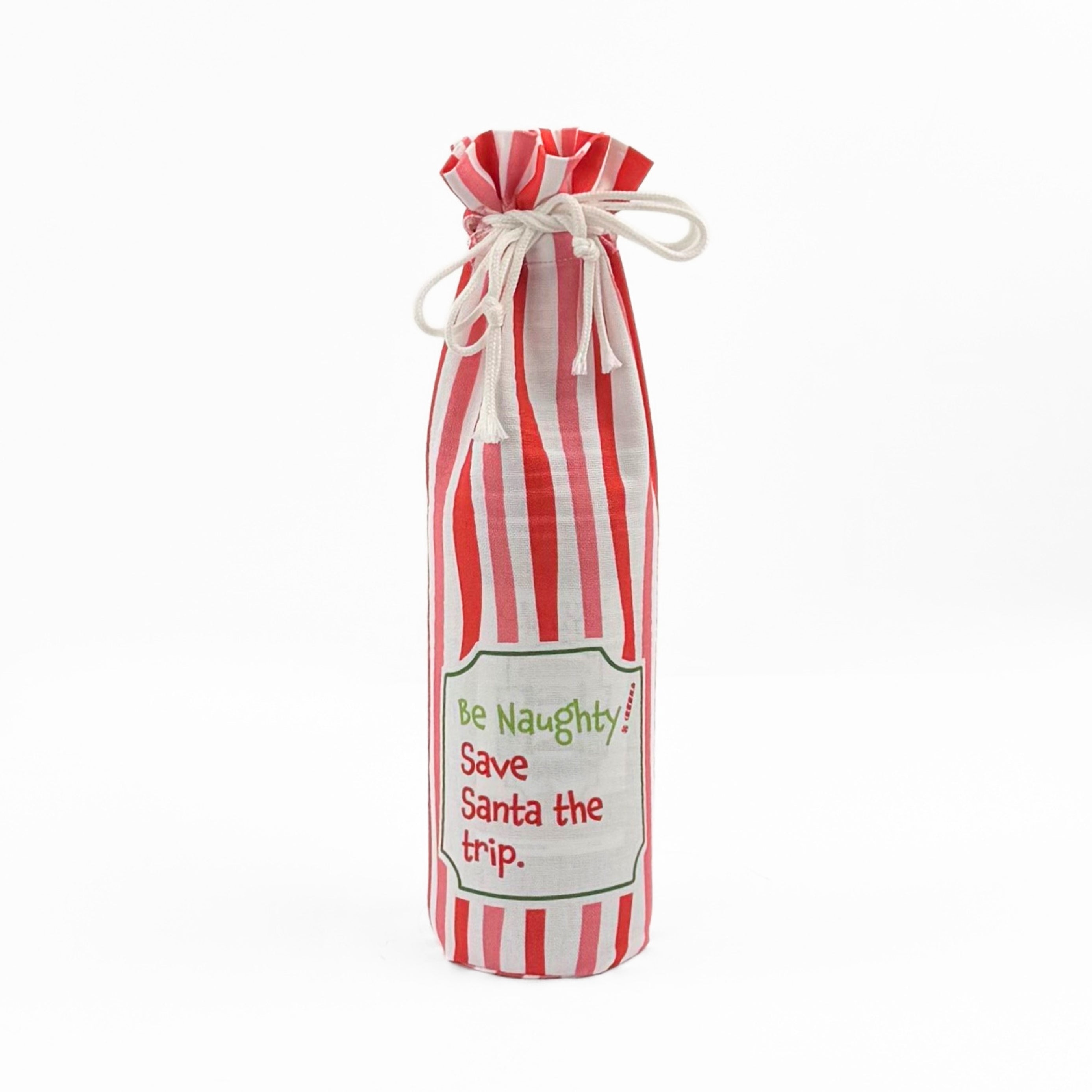 Madcap Cottage Red and white striped bottle bag with a text "Be Naughty! Save Santa the trip" on a white background