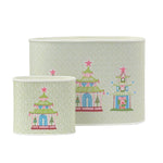 Festive Christmas caddy set featuring colorful pagodas, pink stars, and delicate green patterned backgrounds throughout.