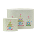 Festive Christmas caddy set featuring colorful pagodas, pink stars, and delicate green patterned backgrounds throughout.