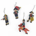 Charming felt patriotic soldier ornaments featuring miniature musicians, horseback riders, and colorful American colonial uniforms.