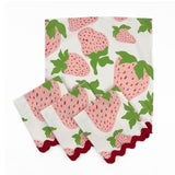 White cloth dinner napkins featuring pink strawberries, green leaves, and red scalloped trim for tablescapes.
