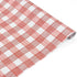 Roll of red and white gingham patterned holiday wrapping paper.