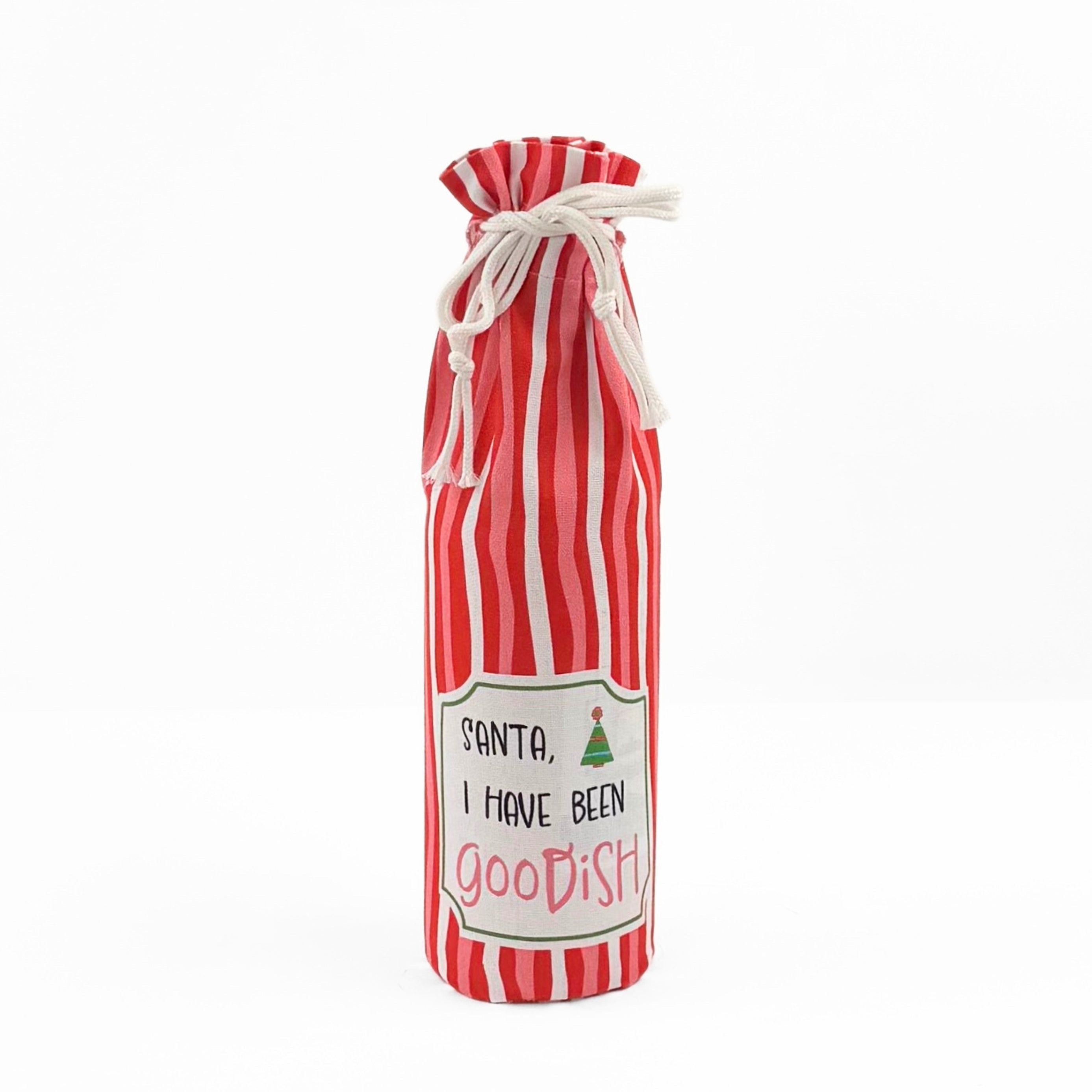 red and white striped wine bag with a “Santa, I have been goodish” label on the front