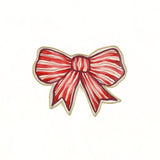 Front view of a red and white striped bow-shaped decorative tray with gold outline.