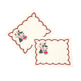 Elegant white cocktail napkins featuring red scalloped borders, colorful Christmas ornaments, holly, and festive embroidery.