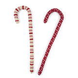 Large felt Christmas candy canes featuring festive red, pink, and cream stripes with playful patterns.