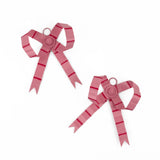 Small pink bow Christmas ornaments featuring red stripes and delicate ribbon loops for festive decorating.
