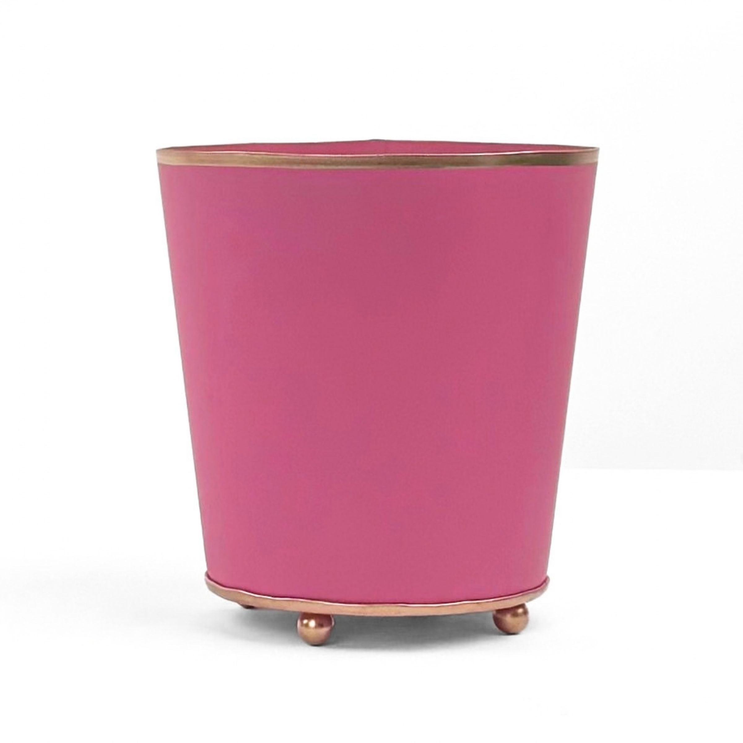 Bright Pink large tole metal cachepot with gold base and trim on a white background