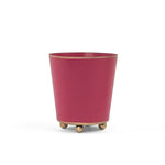 Bright Pink small tole metal cachepot with gold base and trim on a white background