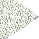 A roll of wrapping paper with a white background and a pattern of small, irregular green and light yellow brushstrokes, shown partially unrolled on a white background.