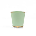Bright Light green large tole metal cachepot with gold base and trim on a white background