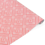a roll of wrapping paper with a geometric lattice pattern in pink