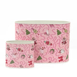 Festive pink Christmas caddy set featuring nutcrackers, swans, Christmas trees, gifts, and whimsical ribbon patterns.