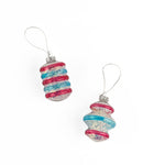 Patriotic tinsel glass ornaments featuring shimmering red, blue, and silver stripes with festive metallic finishes.