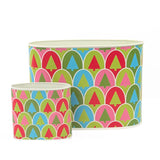 Festive Christmas caddy set featuring colorful retro trees in pink, green, blue, and red patterns.
