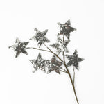 Silver spray of stars featuring sparkling glitter accents, perfect for festive Christmas trees and arrangements.