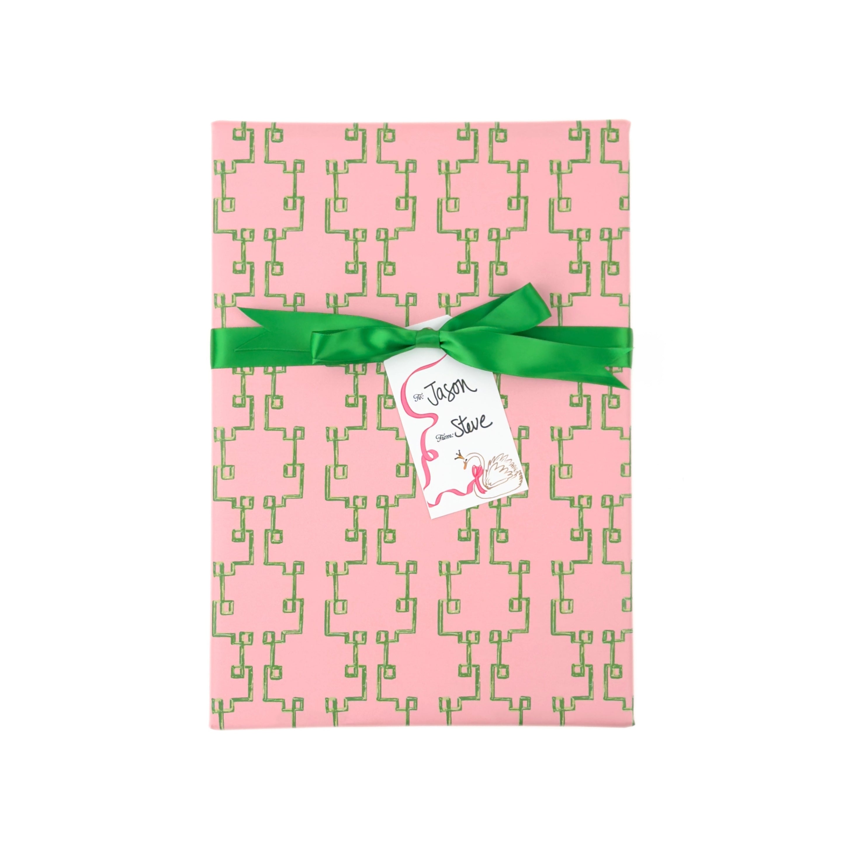 Elegant gift wrapping paper featuring intricate green bamboo lattice patterns on a soft pink background.
