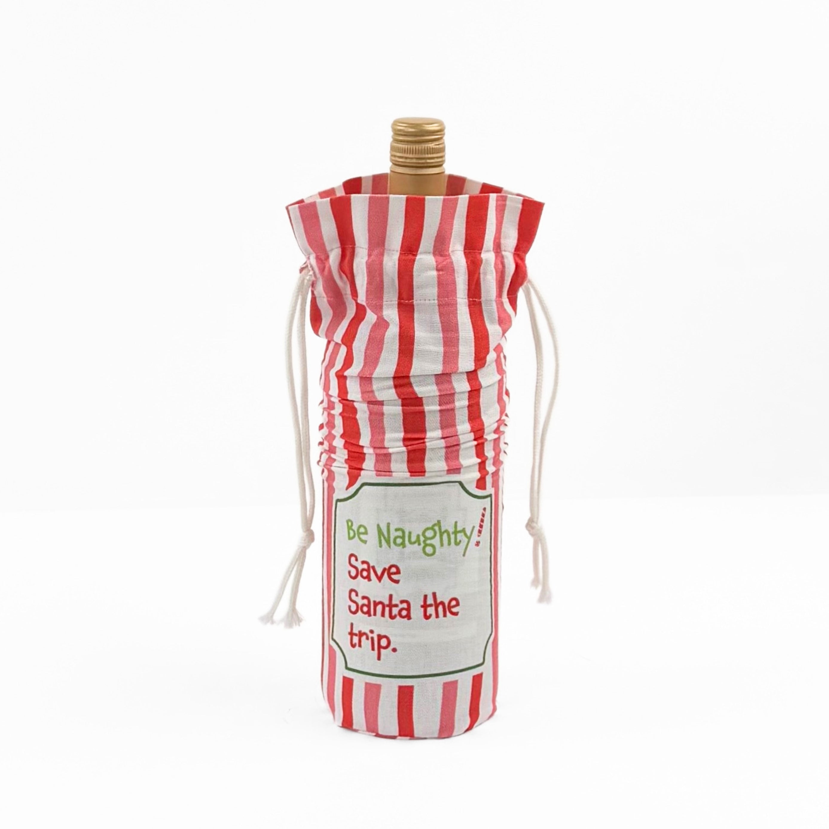 Madcap Cottage Red and white striped bottle bag with a text "Be Naughty! Save Santa the trip" on a white background
