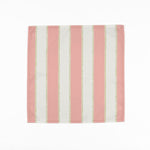 Pink and white striped cloth dinner napkins featuring delicate green dotted accents for elegant tablescapes.