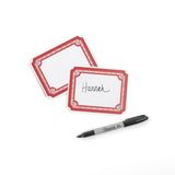 Two Elegant Geranium paper place card featuring a decorative red border and personalized names for table settings.