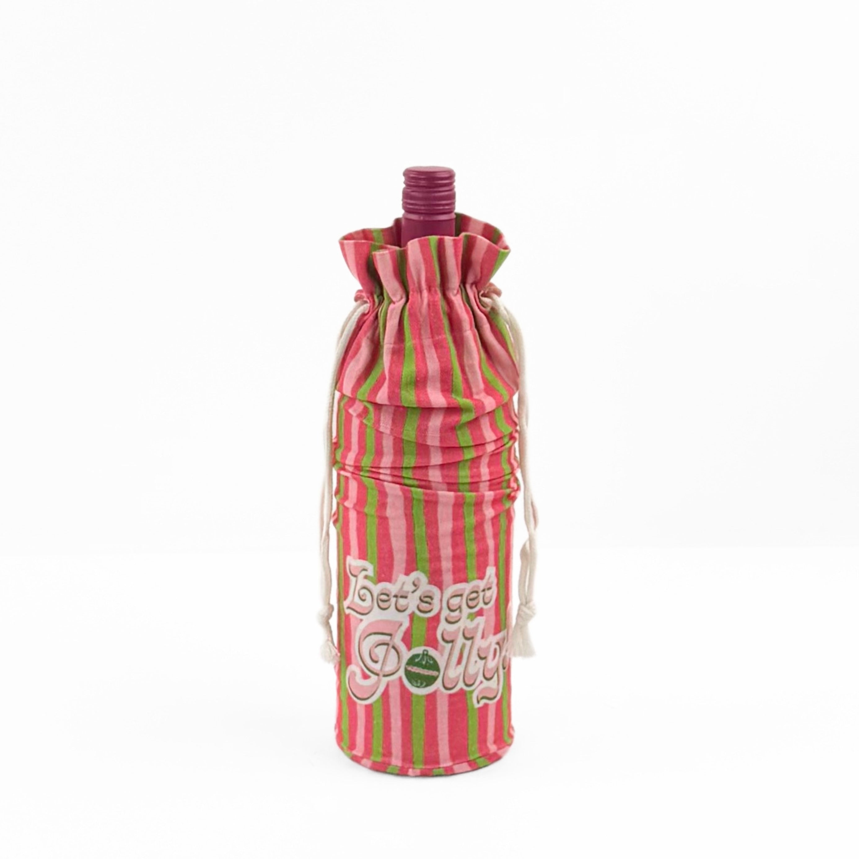 pink and green striped wine bag with “Let’s get jolly!” printed on the front