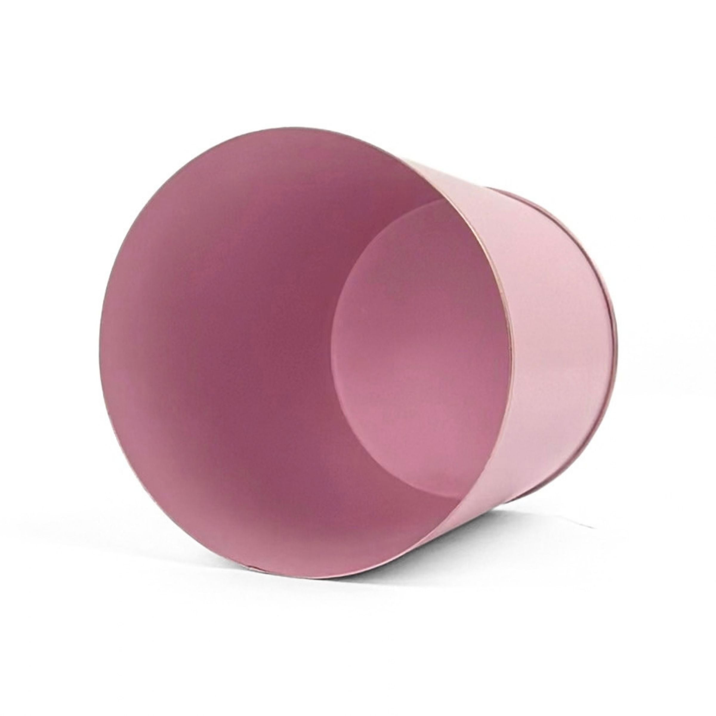 Bright  Light Pink large tole metal cachepot with gold base and trim  showing the inside on a white background