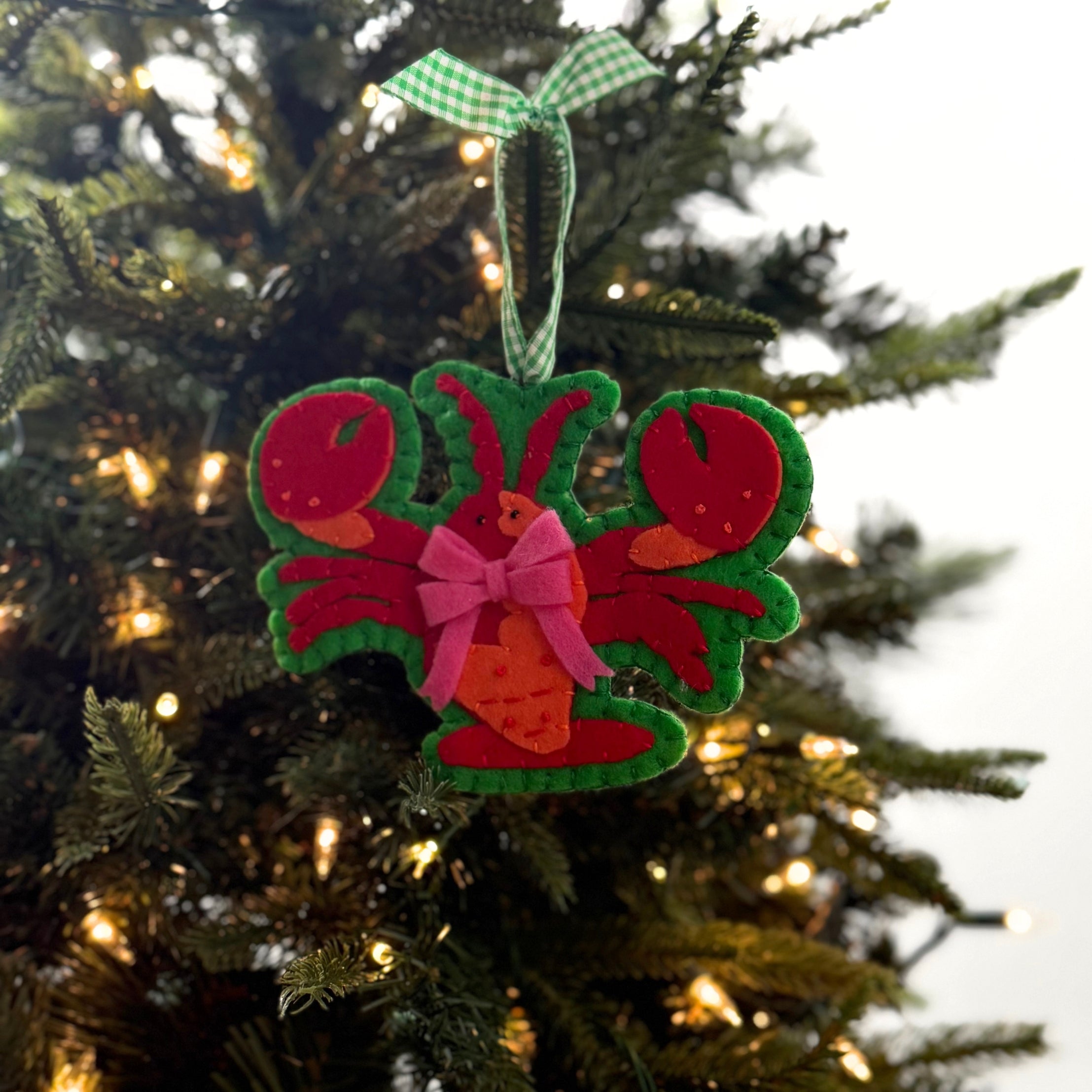 Handcrafted Lobster Felt Christmas Ornament on a white background