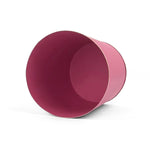 Bright Pink large tole metal cachepot with gold base and trim  showing the inside on a white background