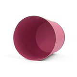 Bright Pink large tole metal cachepot with gold base and trim  showing the inside on a white background