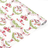 A roll of Christmas
wrapping paper with a repeating pattern of white mice, red bows, green holly, and gift boxes on a white background.