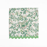 Cloth dinner napkins featuring green Chinese dragon and pink floral prints with green ric rac trim.