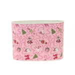 Large Festive pink Christmas caddy featuring nutcrackers, swans, Christmas trees, gifts, and whimsical ribbon patterns.