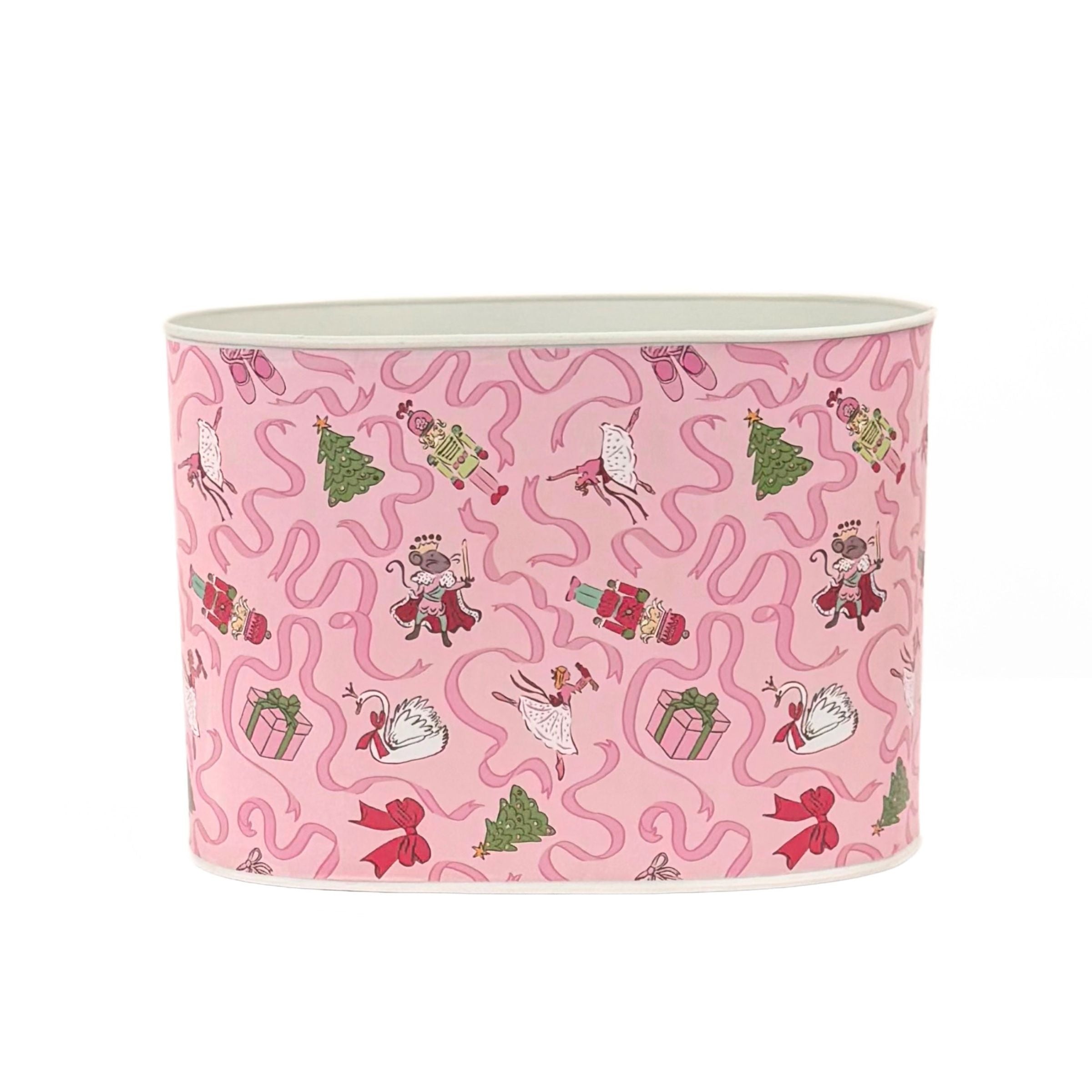 Large Festive pink Christmas caddy featuring nutcrackers, swans, Christmas trees, gifts, and whimsical ribbon patterns.